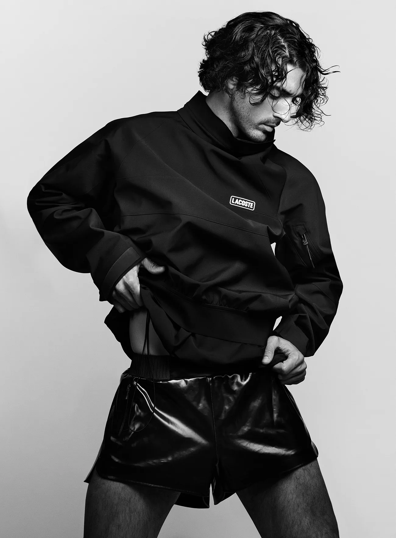 VMan Xuân/Hè 2026: Taylor Zakhar Perez mặc Lacoste, chụp bởi Luigi & Iango